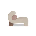 Mia luxury armchair by Nolita Harbour, curved bouclé lounge chair with compact form and architectural wood base.