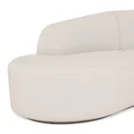 Nathalie II modular sofa close-up by Nolita Harbour in bouclé, curved sectional with integrated tabletop and continuous sculptural seating.