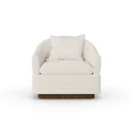 Nina bouclé armchair by Nolita Harbour, luxury lounge chair with sculpted walnut base and refined architectural form.