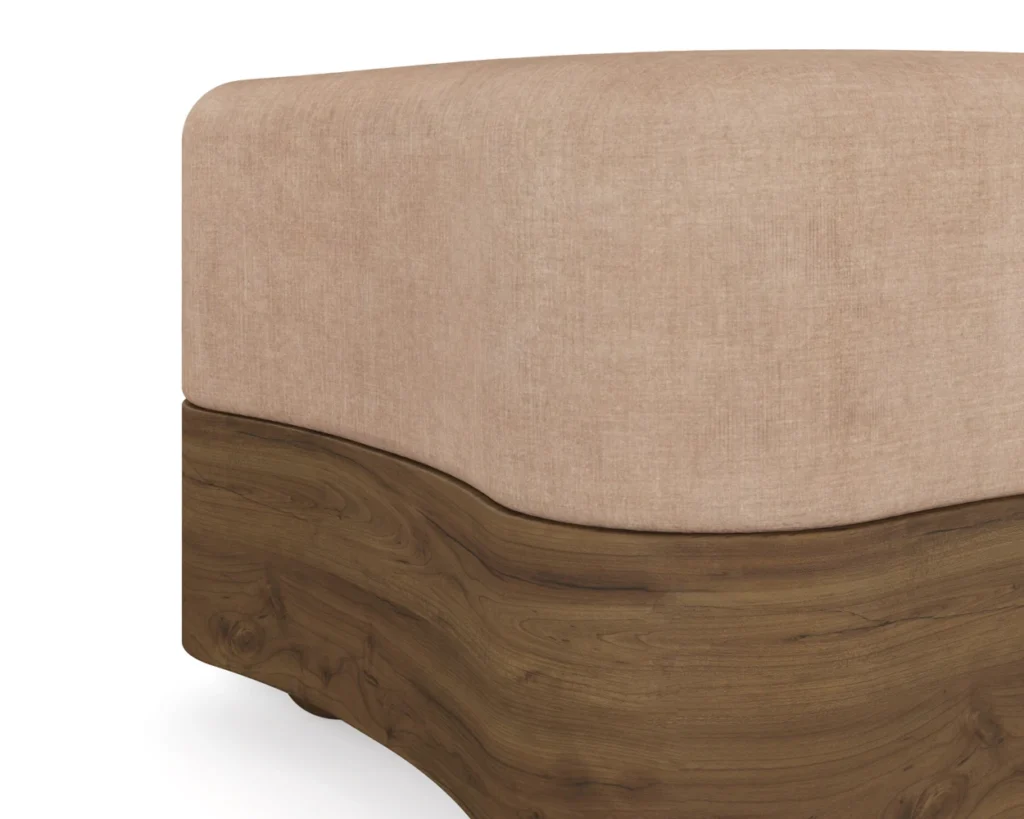 Close-up of Colleen Stool's wave-patterned walnut base and upholstered seat