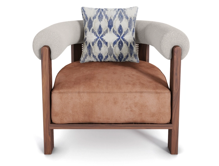 Nolita Harbour Olivia Armchair with a plush seat, rattan back, and matte walnut frame with waved legs.