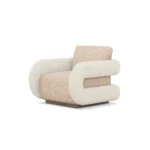 Noor armchair by Nolita Harbour, bouclé upholstered curved armchair with walnut base and sculptural silhouette.
