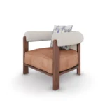Olivia armchair by Nolita Harbour, velvet armchair with rattan back, walnut frame, and sculptural coastal silhouette.