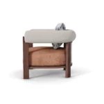 Olivia luxury armchair by Nolita Harbour, walnut and rattan armchair with velvet upholstery and refined organic form.
