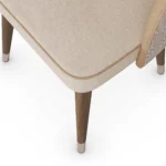 Paris walnut dining chair detail by Nolita Harbour, luxury upholstered chair with curved backrest and refined architectural silhouette.