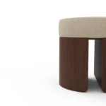 Pauline bouclé stool detail by Nolita Harbour, luxury upholstered stool in textured fabric with solid walnut base and refined silhouette.