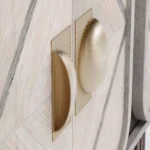 Phillip Sideboard, a sophisticated sideboard by Nolita Harbour in wood and brass, featuring warm tones and precise geometry