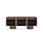 Phillip Sideboard, an architectural sideboard by Nolita Harbour in wood and brass, with geometric doors and a strong linear presence