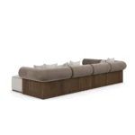 Pierre upholstered sofa by Nolita Harbour, velvet sectional with soft radii and linear design, grounded by walnut base.