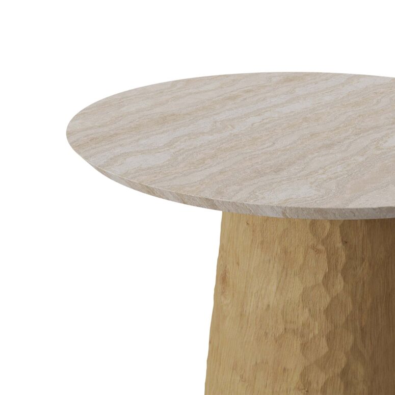 A chic Elke Side Table with a travertine top and a carved oak base with varnish finish. The table combines natural elegance with intricate craftsmanship.