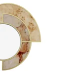 Details of Sierra Mirror by Nolita Harbour, luxury wall mirror featuring architectural segmented frame in poplar root burl, Aegean Rose marble, and brass accents, graphic sculptural presence with balanced materials and clean reflective surface.