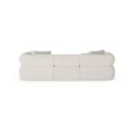 Soléne upholstered sofa by Nolita Harbour, bouclé sectional with walnut base, deep seating and organic curved silhouette.