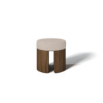 Front view of Pauline Stool with round upholstered seat and walnut base