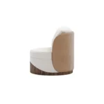 Balli bouclé armchair by Nolita Harbour, upholstered chair with curved velvet shell and elegant architectural walnut base.