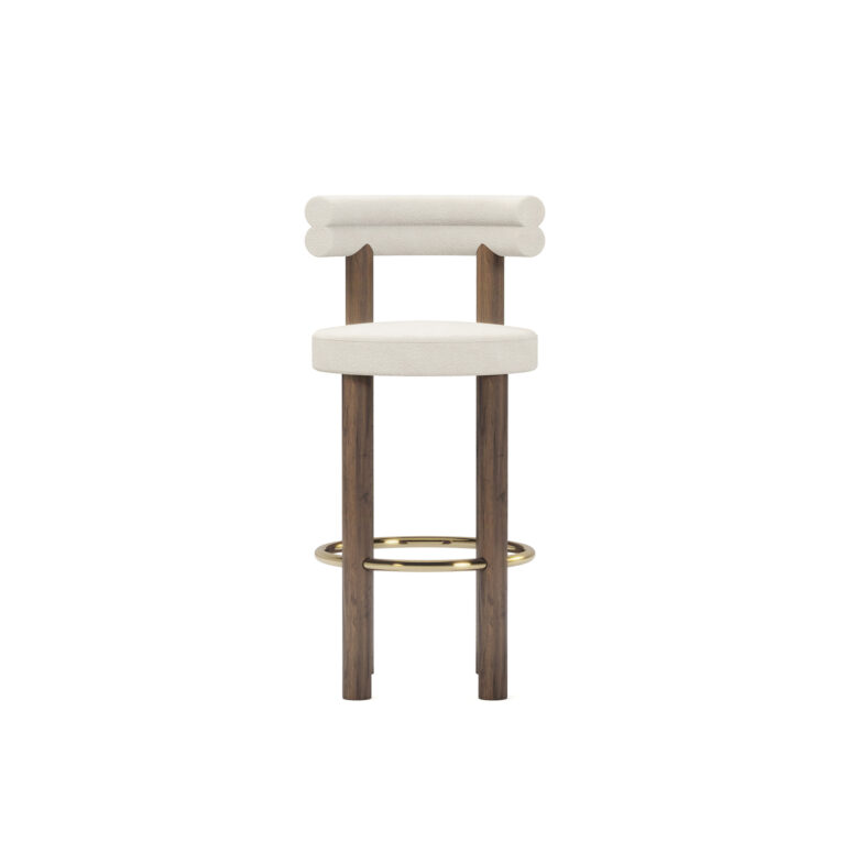 Modern luxury bar chair with cream upholstery, double-roll backrest, walnut legs, and brass-finished footrest, designed by Nolita Harbour. Front view