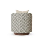Carrie contemporary armchair by Nolita Harbour, velvet upholstered chair with organic rounded form and sculptural walnut plinth.