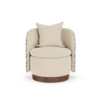 Carrie velvet armchair by Nolita Harbour, luxury lounge chair with curved shell, circular seat, and refined walnut base.