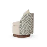 Carrie designer armchair by Nolita Harbour, velvet upholstered chair with circular seat, sculptural wrap, and walnut plinth.