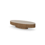 Round Matti coffee table with a travertine top and ribbed walnut base, designed by Nolita Harbour. 45 degree