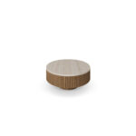 Round Matti coffee table with a travertine top and ribbed walnut base, designed by Nolita Harbour. side View