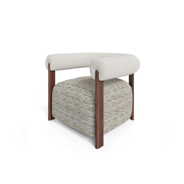 Claire armchair by Nolita Harbour, upholstered armchair with walnut frame and cylindrical arms, sculptural contemporary design.