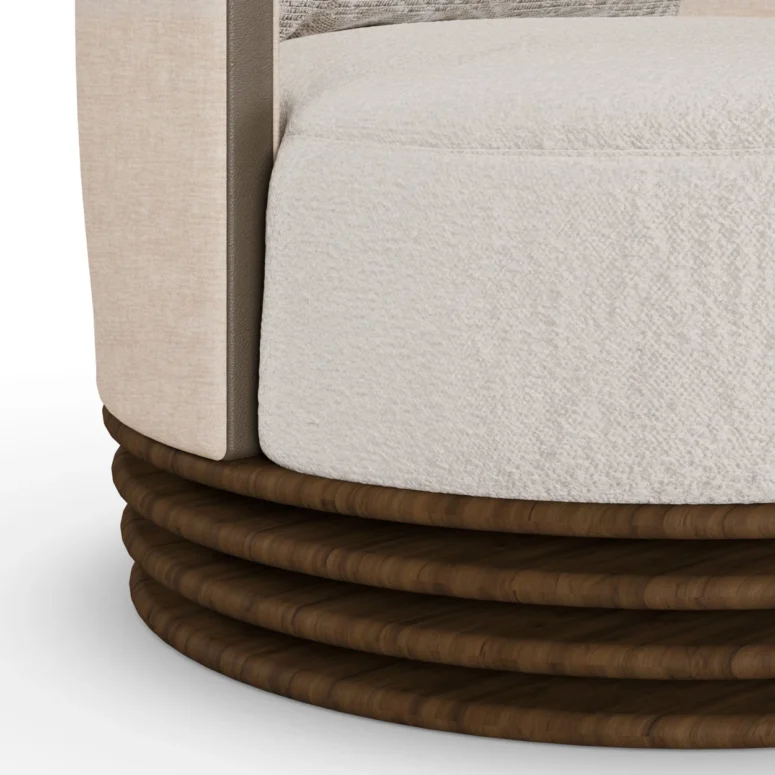 Beige and cream luxury armchair with patterned cushion and ribbed walnut base, designed by Nolita Harbour. detail view