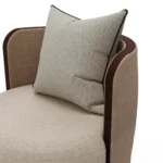 Dawn bouclé armchair detail by Nolita Harbour, luxury lounge chair with circular seat and ribbed walnut plinth.