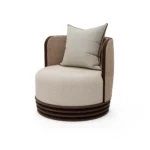 Dawn armchair by Nolita Harbour, bouclé upholstered armchair with ribbed walnut base and sculptural rounded silhouette.
