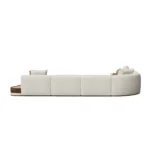 Gino luxury sofa back view, bouclé modular sectional with walnut plinth and stone tray detail, Nolita Harbour furniture.