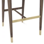 Hazel luxury bar stool detail by Nolita Harbour, velvet chair with wood base, soft curves, and supportive architectural form.