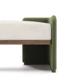 Hinga upholstered bench detail by Nolita Harbour, bouclé and velvet bench with walnut frame, light architectural profile.