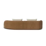 Latte luxury sofa by Nolita Harbour, curved velvet sofa, back view with organic lines and elegant, contemporary presence.