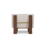 Mika walnut base armchair by Nolita Harbour, bouclé upholstered chair with soft curves and modern luxury design.