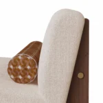 Mika bouclé armchair by Nolita Harbour detail, luxury lounge chair with continuous curved shell and refined walnut plinth.