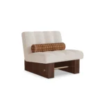 Mika by Nolita Harbour, bouclé upholstered armchair with walnut base and sculptural curved silhouette.