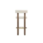 Odette contemporary bar chair by Nolita Harbour, bouclé upholstered stool with curved back and refined walnut base.