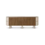 Peter Sideboard. a refined sideboard by Nolita Harbour crafted in walnut, travertine, and velvet, with smooth stone and soft textile accents