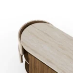 Peter Sideboard, a sculptural sideboard by Nolita Harbour in walnut, travertine, and velvet, combining curved forms with rich materials