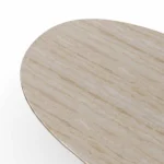 Santi Dining Table, a sculptural dining table by Nolita Harbour in stone, wood, and brass, with a monolithic presence.