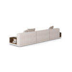 Gino Modular Sofa with plush upholstery and built-in walnut shelving - 45-degree view