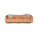 Orange luxury sofa with wave-inspired design, featuring plush upholstery, ribbed walnut matte base, and neutral-colored cushions, by Nolita Harbour. front view