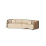 Luxury sofa with cream-colored upholstery, beige fabric accents, and patterned cushions, featuring a low-profile design by Nolita Harbour. Front View