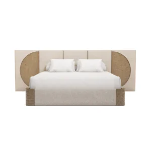 Claude Bed by Nolita Harbour, a designer bed in carved oak and bouclé upholstery with an oversized headboard.