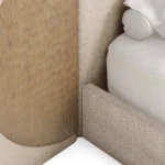 Claude Bed is a modern bed by Nolita Harbour in oak wood and bouclé fabric, sculptural oversized headboard.