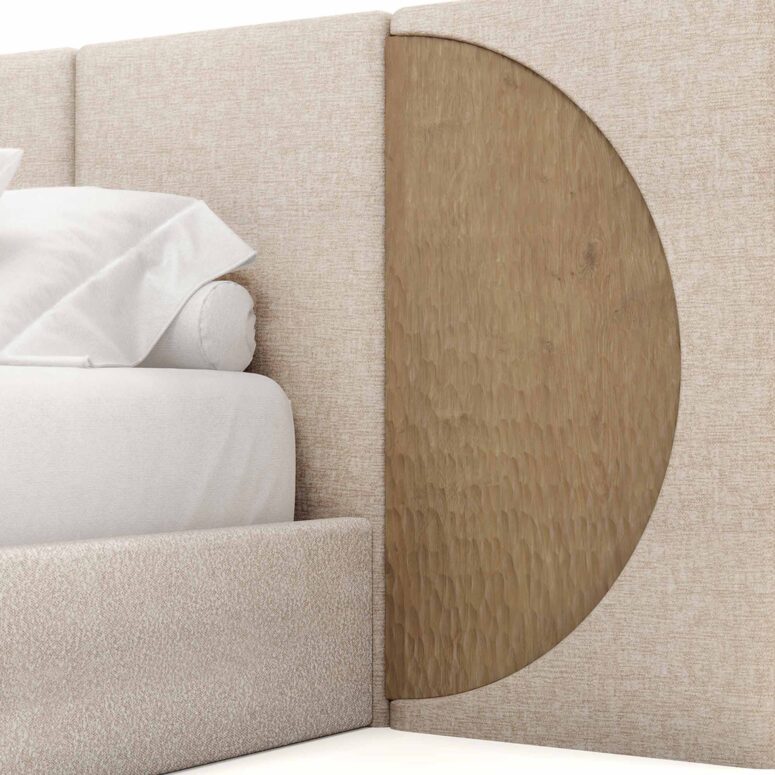 Claude bed featuring a headboard with neutral bouclé upholstery and carved varnished oak accents, sleek modern design with circular wood details on the sides. detail view