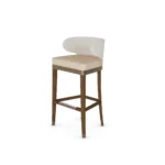 Méredith bar chair by Nolita Harbour, velvet bar stool with wood frame and metal footrest, refined curved-back design.