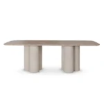 Petra Dining Table, a modern dining table by Nolita Harbour in Light Emperador marble, with a minimalist silhouette and solid structure
