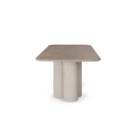 Petra Dining Table, a sophisticated dining table by Nolita Harbour in Light Emperador marble, featuring a balanced form and rich stone texture