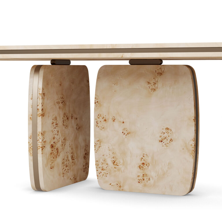 Assia dining table made of poplar root with sculptural legs and polished brass detailing. Leg's detail view