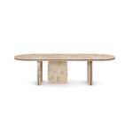 Assia dining table made of poplar root with sculptural legs and polished brass detailing. Front View